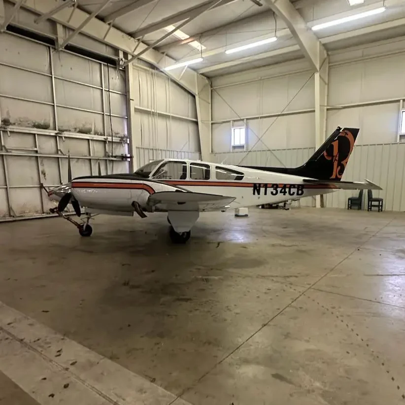 Baron 56TC twin-engine aircraft on the ramp